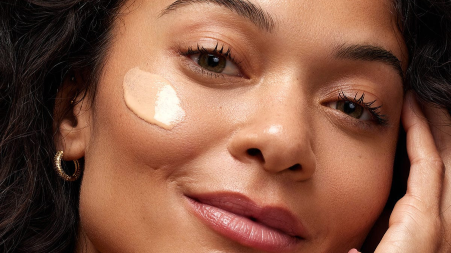 Woman Wearing DRMTLGY’s Niacinamide Tinted Moisturizer